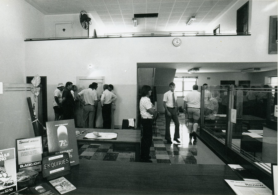 Bank staff assessing damage to the safe. This photograph, by local photographer, Bruce Devine, made it on to the front page of newspapers all over the world. Tweed Regional Museum Collection MUS2019.87.545